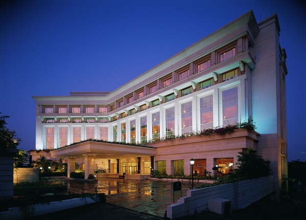 A large, multi-story hotel with a grand entrance, a spacious courtyard, and a well-lit facade. - ITC Kakatiya, a Luxury Collection Hotel, Hyderabad (Hyderabad)