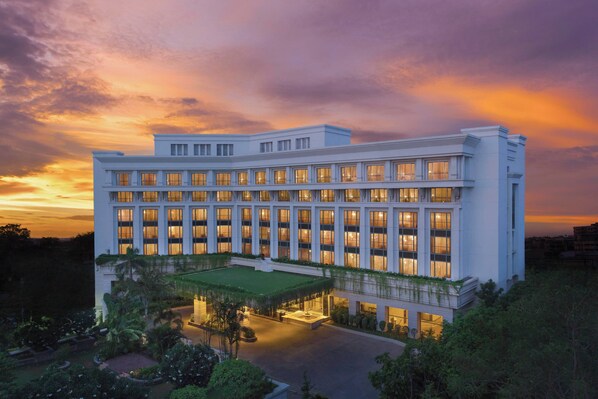 A large, multi-story hotel with a symmetrical facade, a central courtyard, and a well-lit entrance. - ITC Kakatiya, a Luxury Collection Hotel, Hyderabad (Hyderabad)