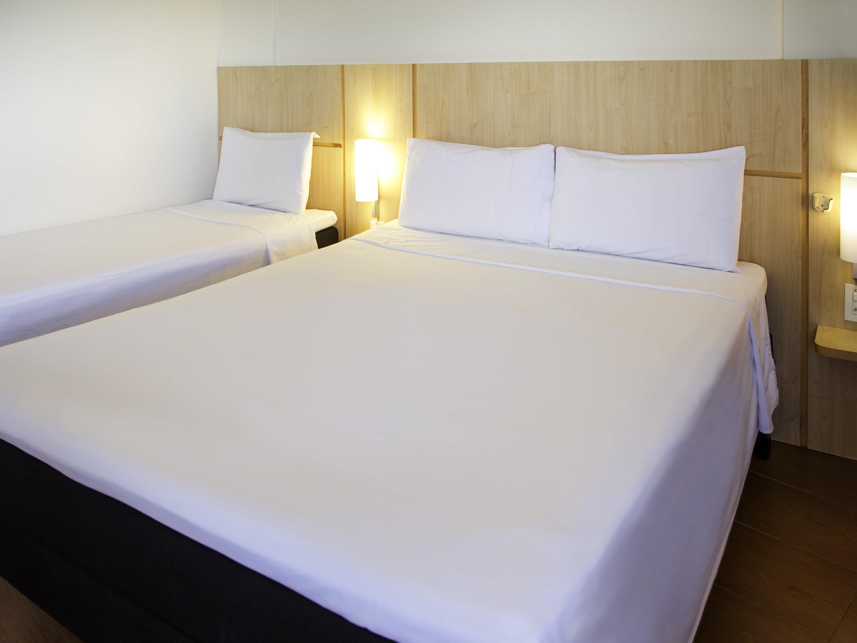 Standard Room, Multiple Beds | In-room safe, desk, free WiFi, bed sheets