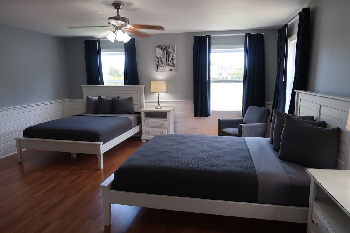Standard Room, 2 Queen Beds, Courtyard View, 1st Floor, Pet Friendly | Iron/ironing board, free WiFi, bed sheets, alarm clocks