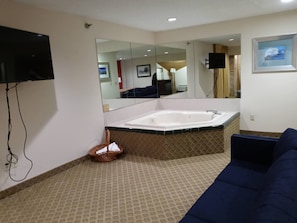 Room, 1 King Bed, Non Smoking, Jetted Tub | Desk, iron/ironing board, rollaway beds, free WiFi
