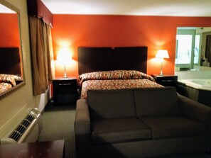 Quarto, 1 cama King, para não fumantes, banheira de hidromassagem | Escrivaninha, ferros/tábuas de passar roupa