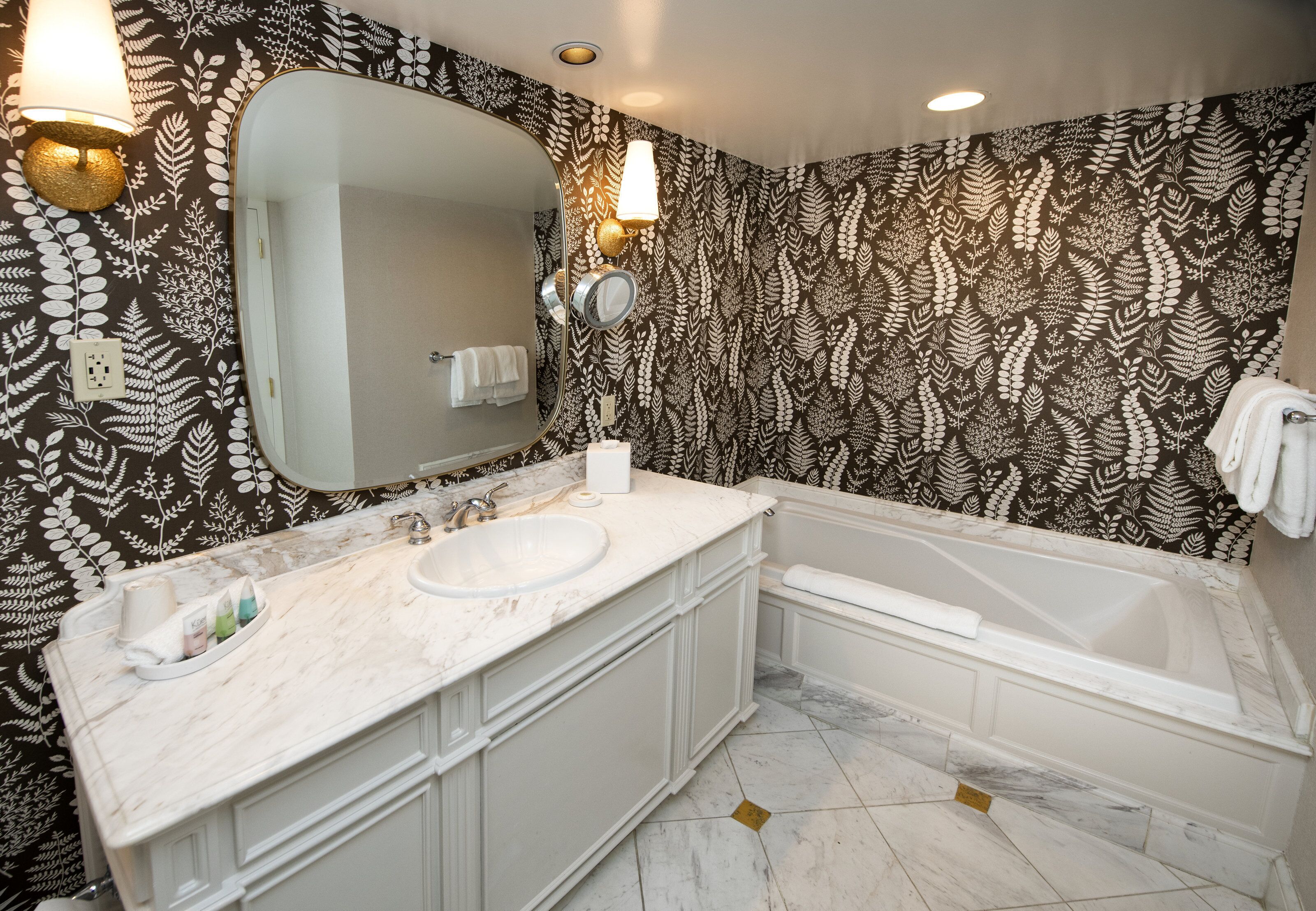 separate bathtub and shower, deep-soaking bathtub, hair dryer, towels