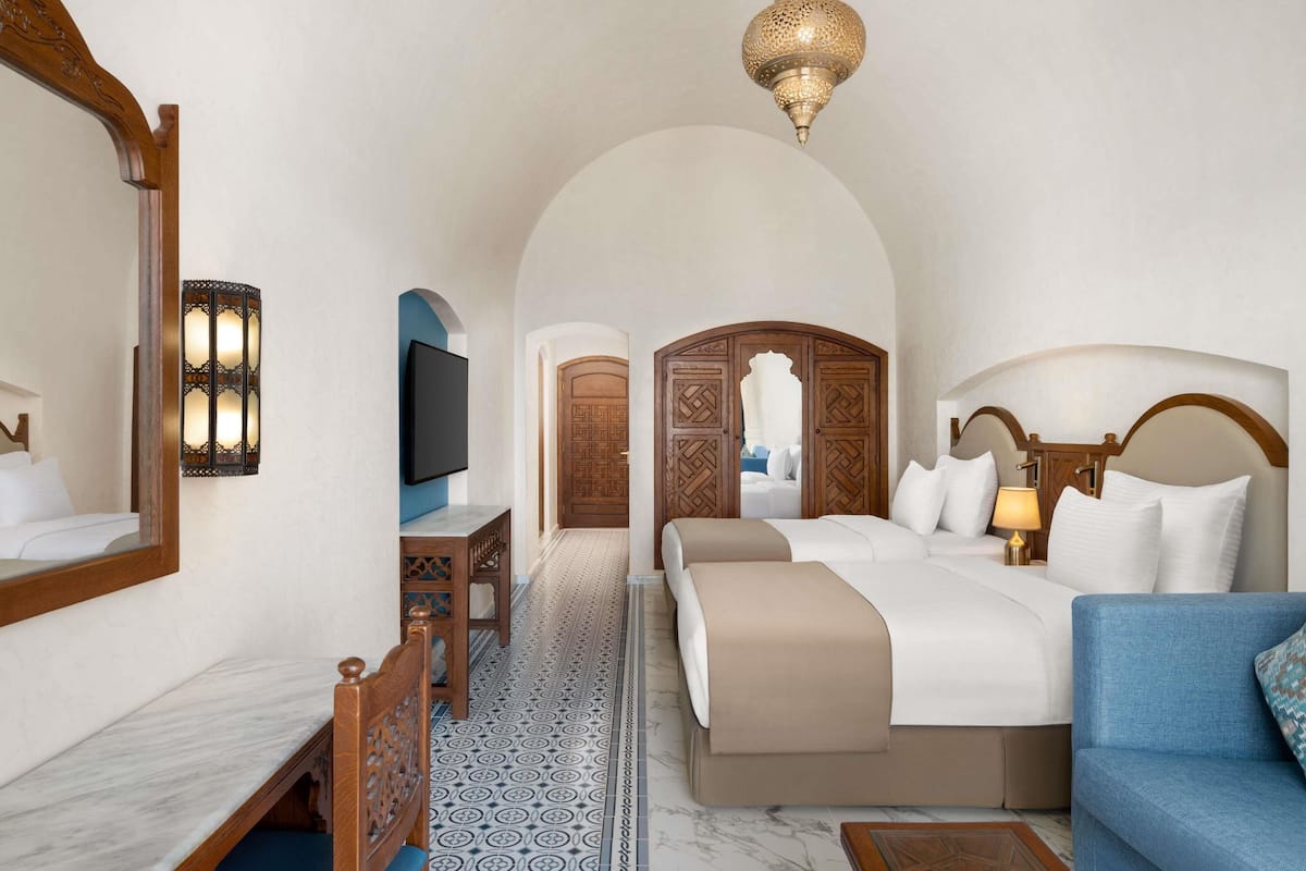 Premium bedding, minibar, in-room safe, blackout drapes