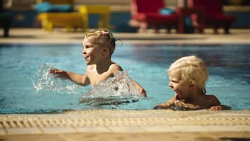 Outdoor pool, open 8:30 AM to 5:30 PM, pool umbrellas, pool loungers