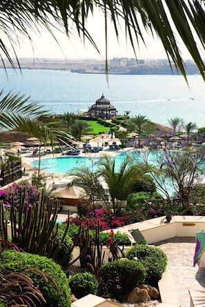 Outdoor pool, open 8:30 AM to 5:30 PM, pool umbrellas, pool loungers
