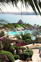Outdoor pool, open 8:30 AM to 5:30 PM, pool umbrellas, sun loungers