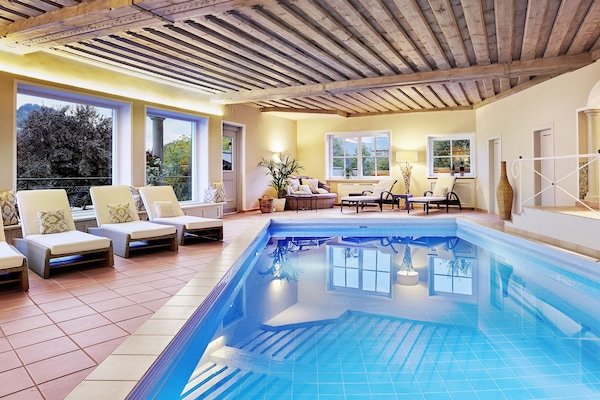 Indoor pool, seasonal outdoor pool, open 8 AM to 8 PM, free cabanas