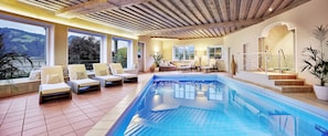 Indoor pool, seasonal outdoor pool, open 8 AM to 8 PM, free cabanas
