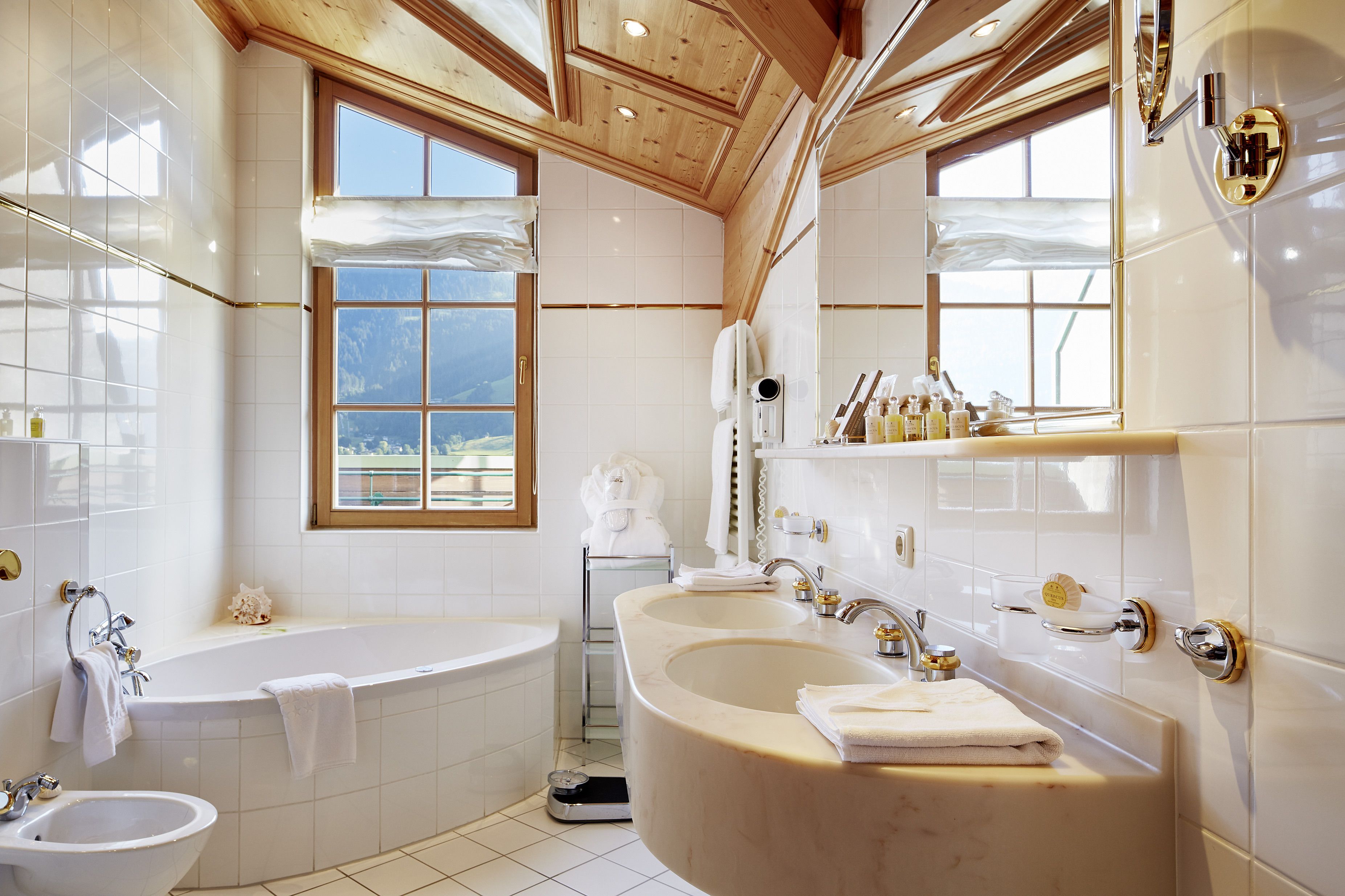 deep-soaking bathtub, free toiletries, hair dryer, bathrobes