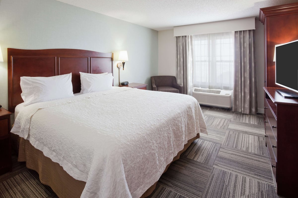 Suite, 1 King Bed, Non Smoking (2 Rooms) | Desk, blackout drapes, iron/ironing board, free cribs/infant beds