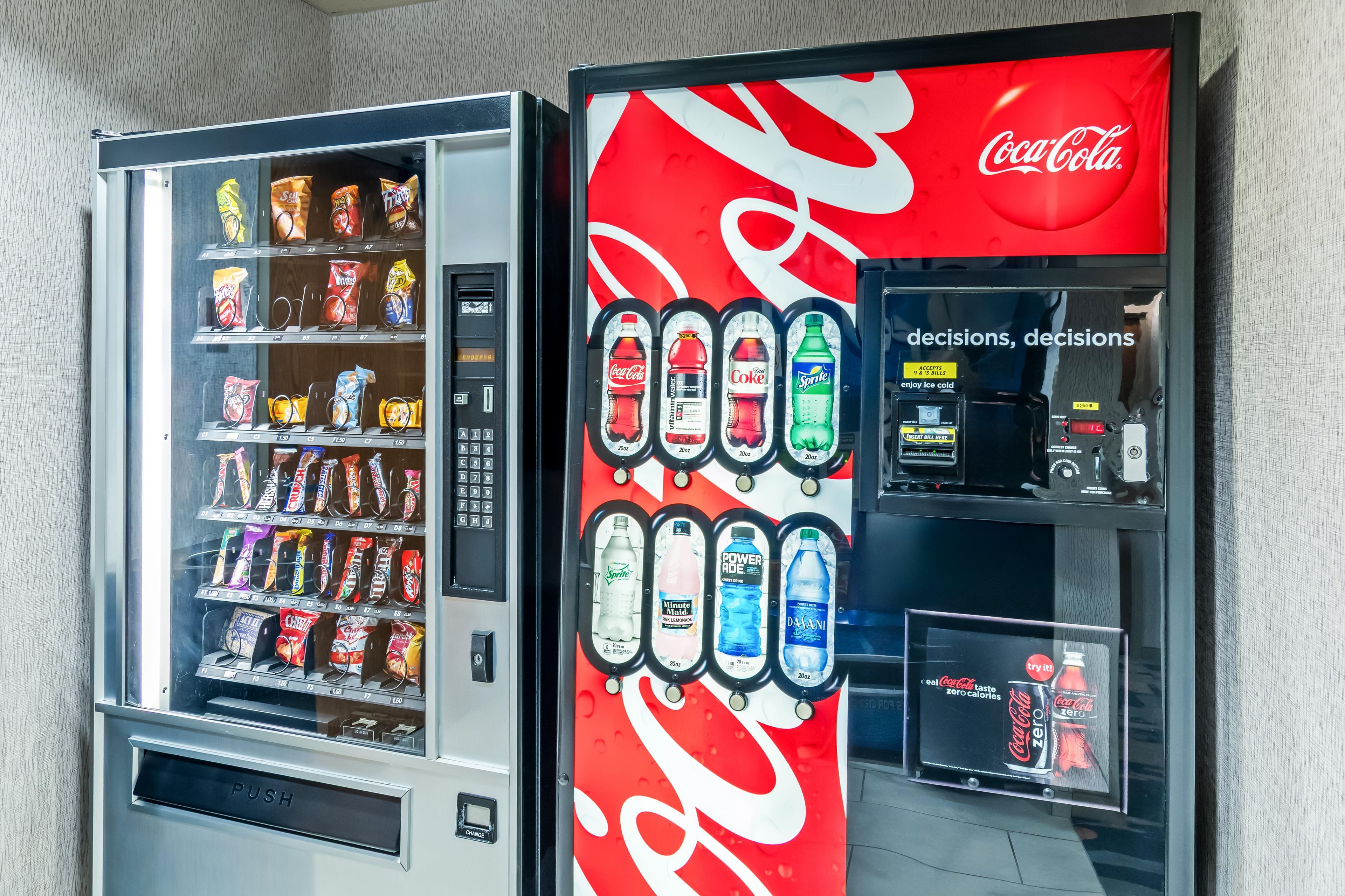 A vending machine with various snacks and beverages, including Coca-Cola and Diet Coke.
