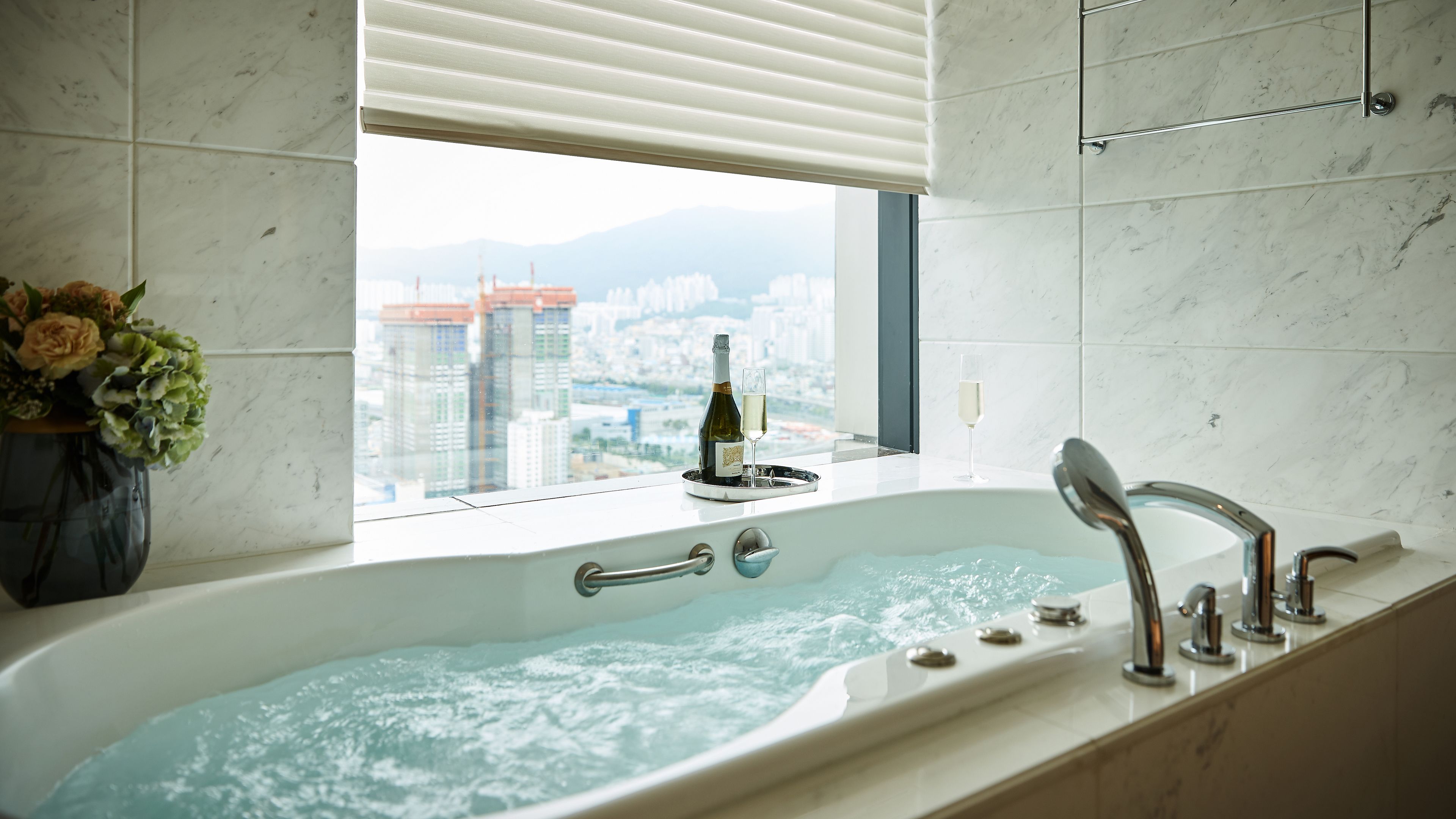 combined shower/bathtub, deep-soaking bathtub, hair dryer, bathrobes