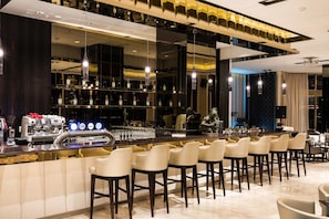 2 bars/lounges, poolside bar
