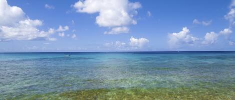 On the beach, sun loungers, beach towels
