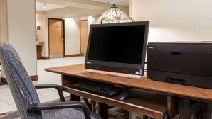 A hotel workspace with a desktop computer, keyboard, mouse, and printer. - Baymont Inn & Suites by Wyndham Anchorage Airport (Anchorage)