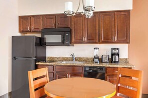 Full-sized fridge, microwave, stovetop, dishwasher