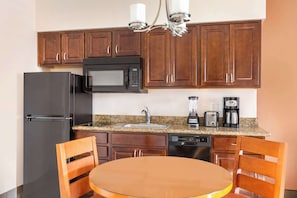 Full-sized fridge, microwave, stovetop, dishwasher