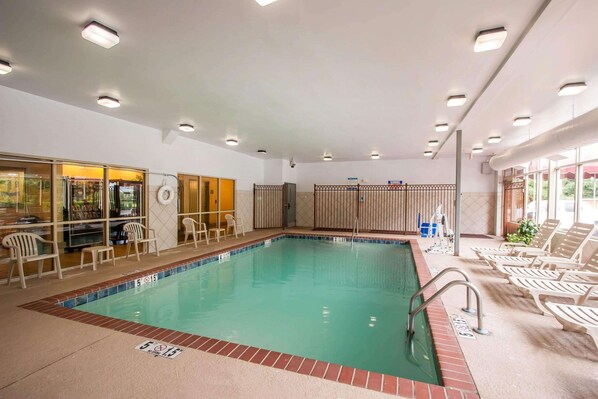 Indoor pool, open 6 AM to 10 PM, pool loungers