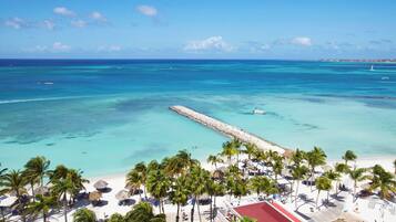 On the beach, free beach cabanas, sun-loungers, beach umbrellas