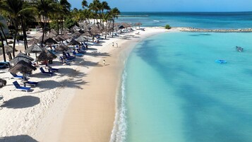 On the beach, free beach cabanas, sun loungers, beach umbrellas