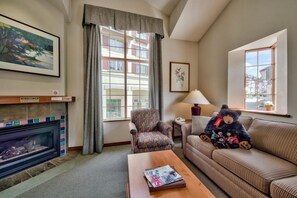 Lofted Studio Queen | Living area | 32-inch LCD TV with digital channels, TV, DVD player