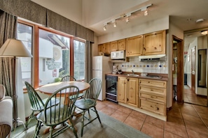 Lofted Studio Queen | Private kitchen | Full-size fridge, microwave, coffee/tea maker, toaster
