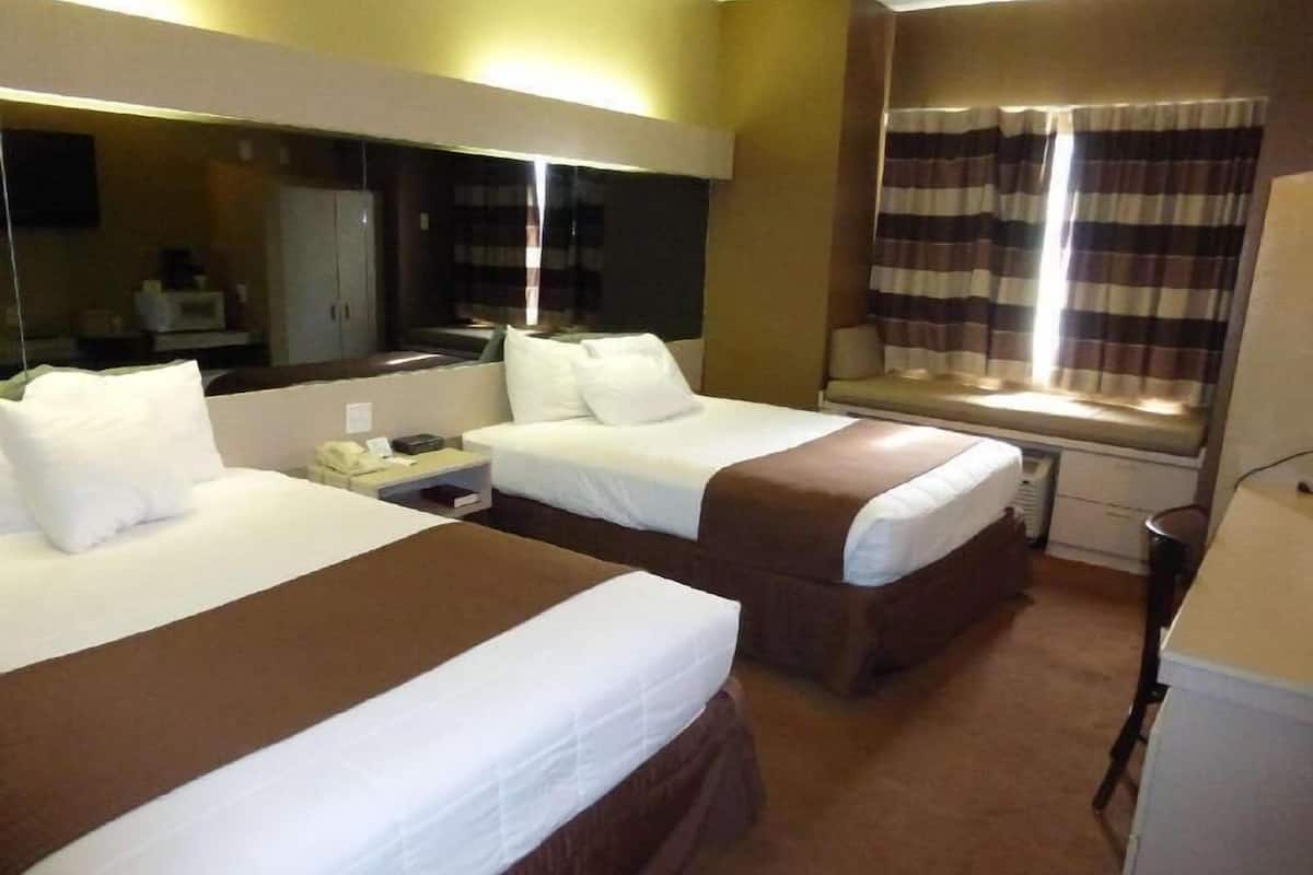 Desk, laptop workspace, blackout curtains, free WiFi