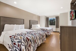 Deluxe Room, 2 Queen Beds, Non Smoking | Desk, laptop workspace, blackout drapes, free cribs/infant beds