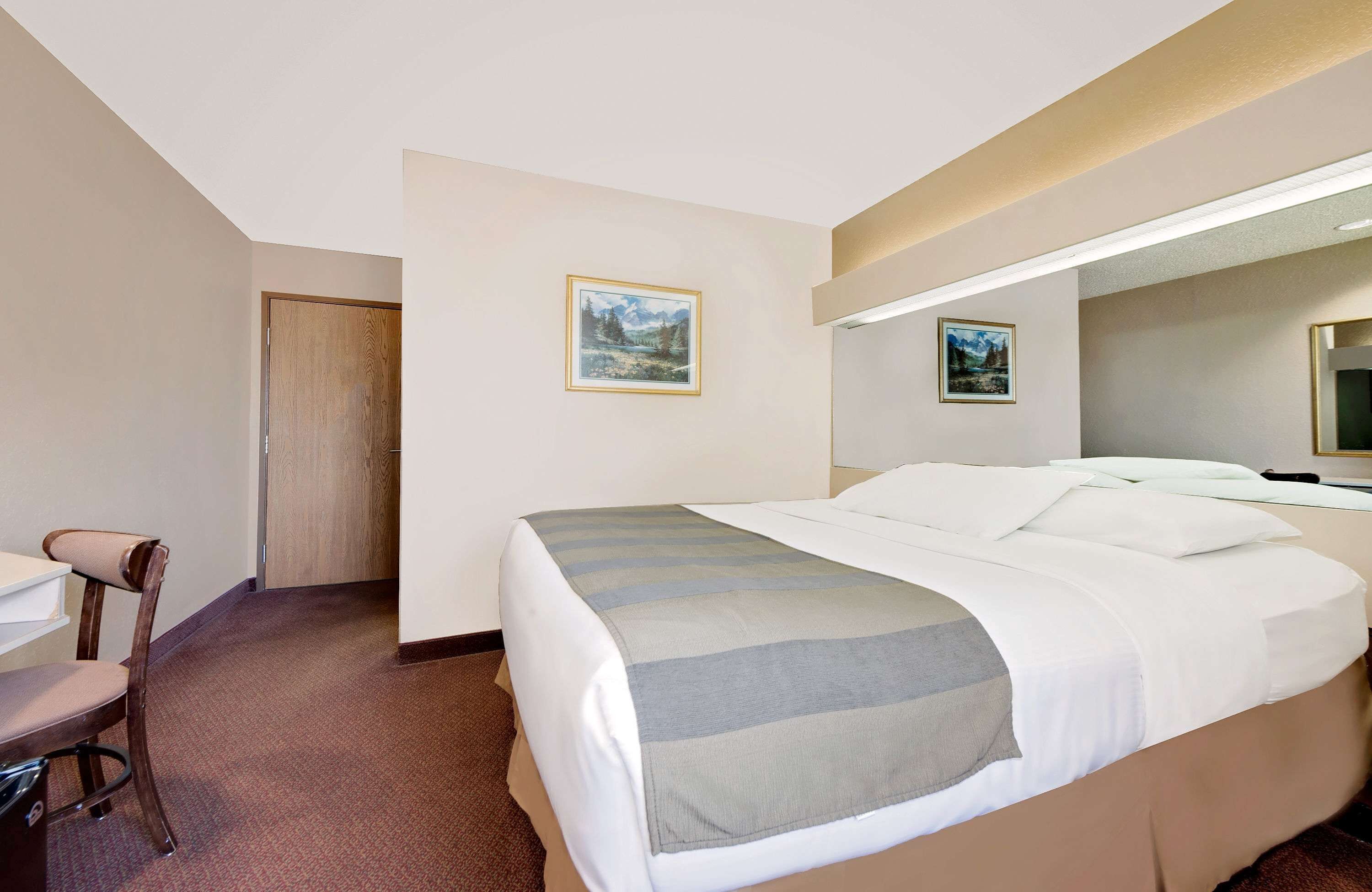 Desk, blackout curtains, free WiFi, bed sheets
