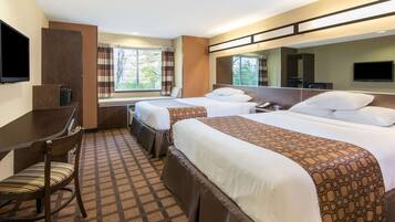 Desk, blackout drapes, iron/ironing board, free cribs/infant beds