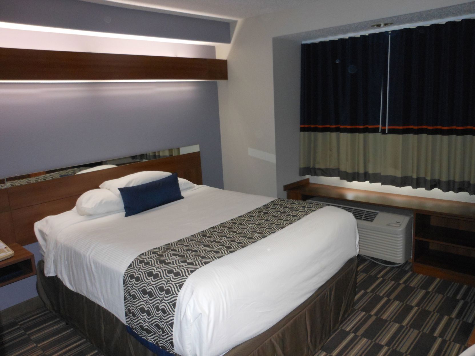 Down comforters, pillowtop beds, desk, iron/ironing board