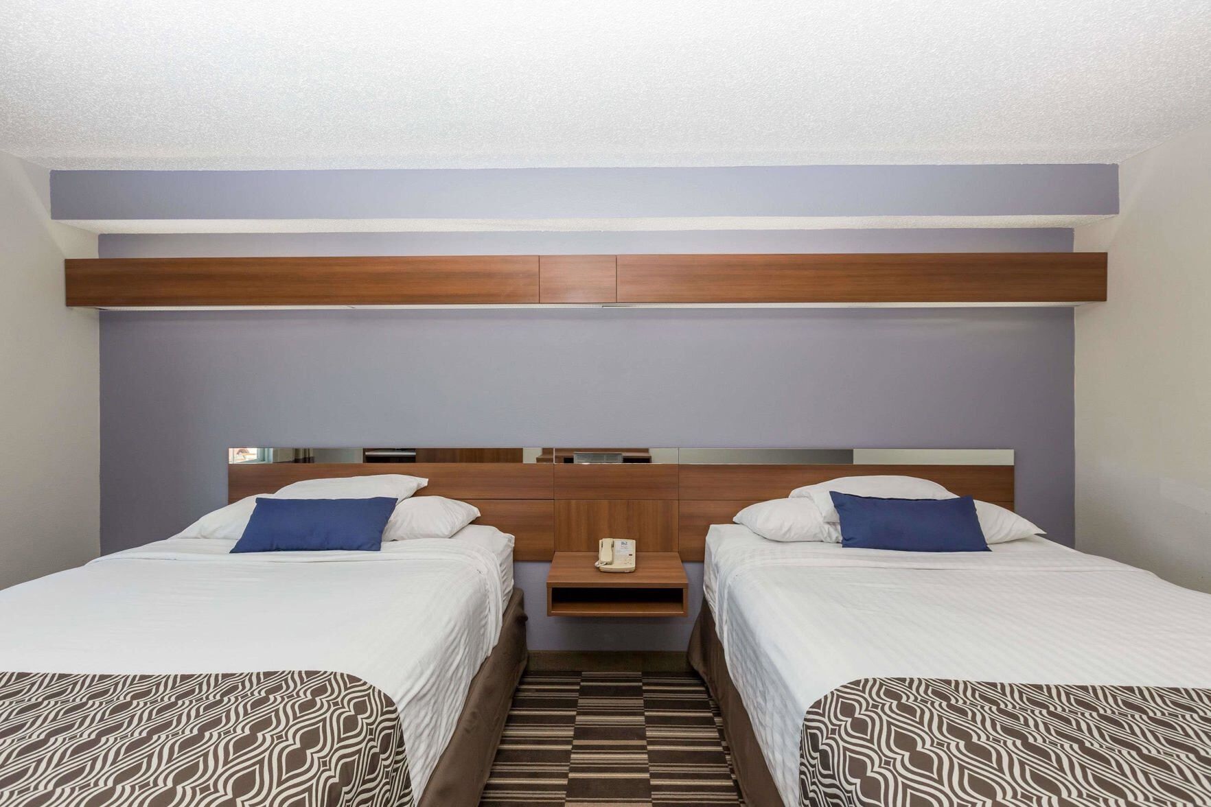 Down comforters, pillowtop beds, desk, iron/ironing board