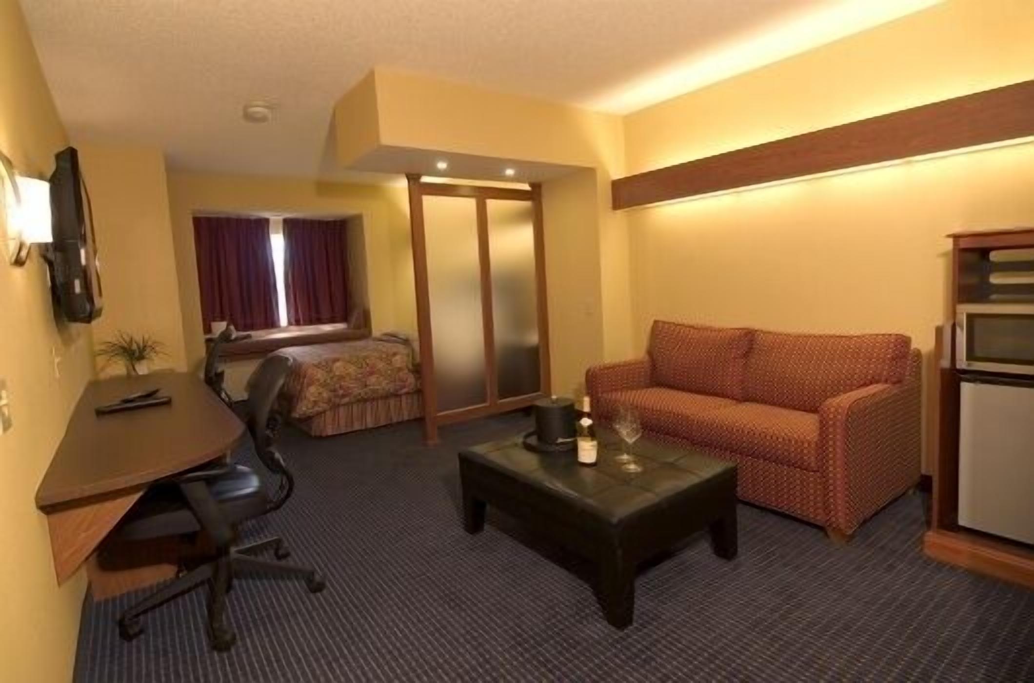 junior suite, 1 queen bed with sofa bed, accessible | in-room safe, desk, iron/ironing board, free cots/infant beds