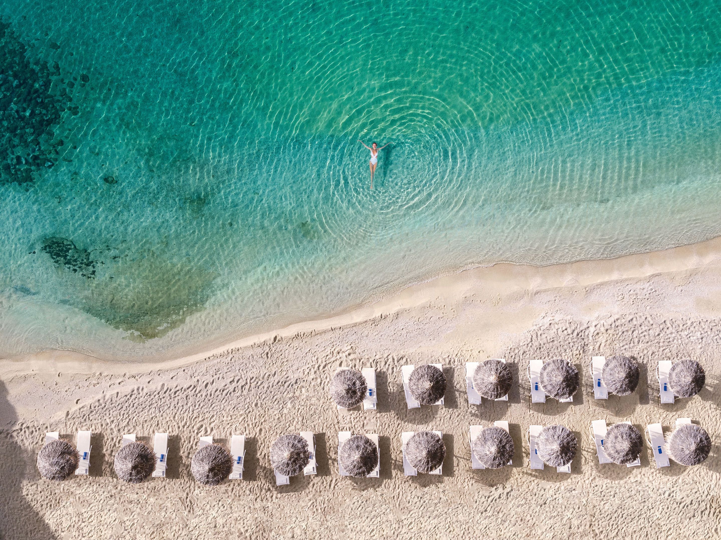 On the beach, sun loungers, beach umbrellas, beach towels