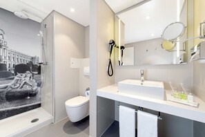 Eco-friendly toiletries, hair dryer, bathrobes, slippers