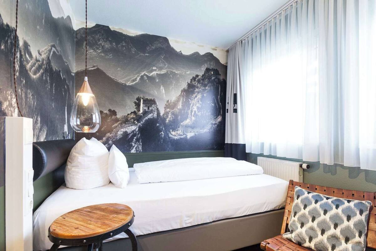 Hypo-allergenic bedding, free minibar items, desk, blackout curtains