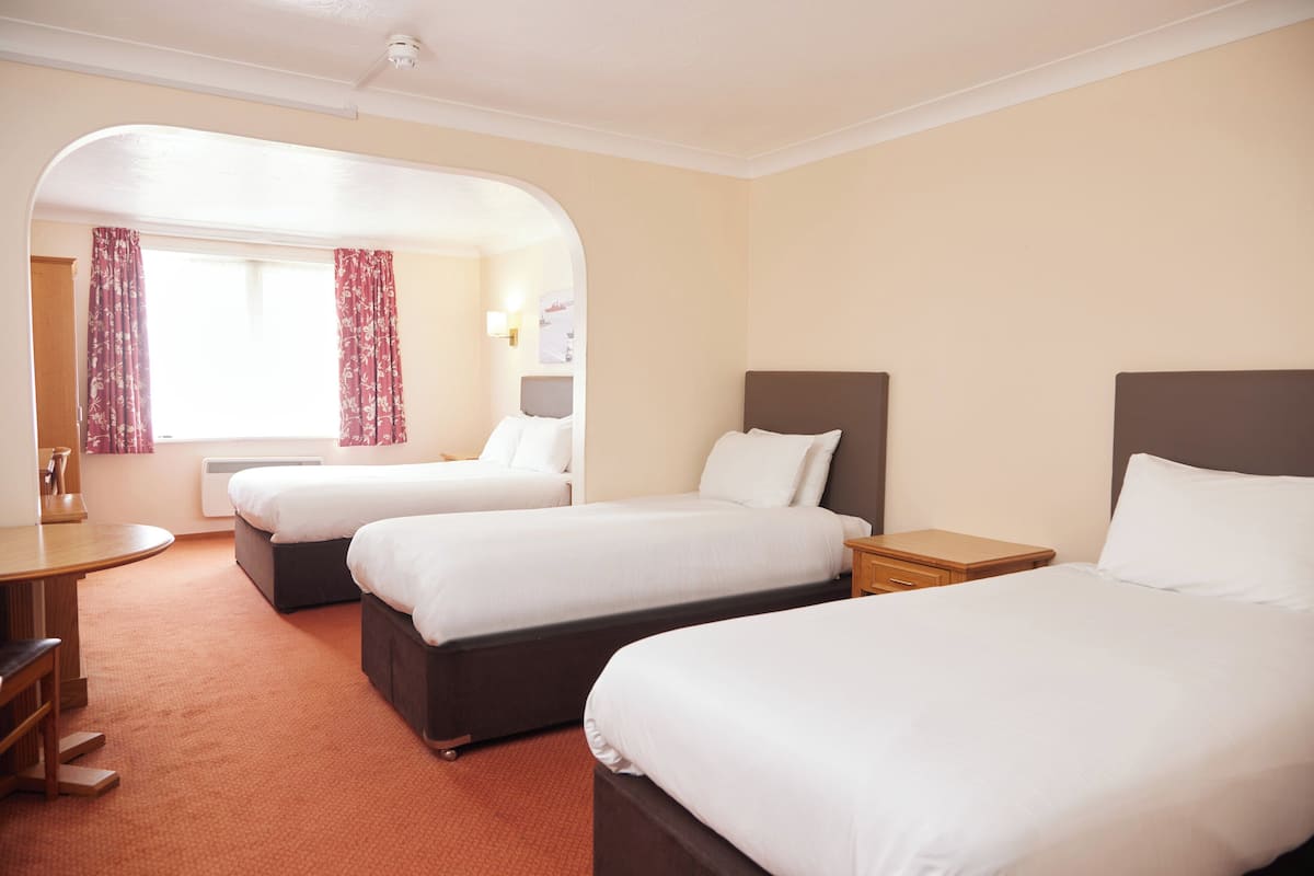 Desk, iron/ironing board, free wired Internet, bed sheets