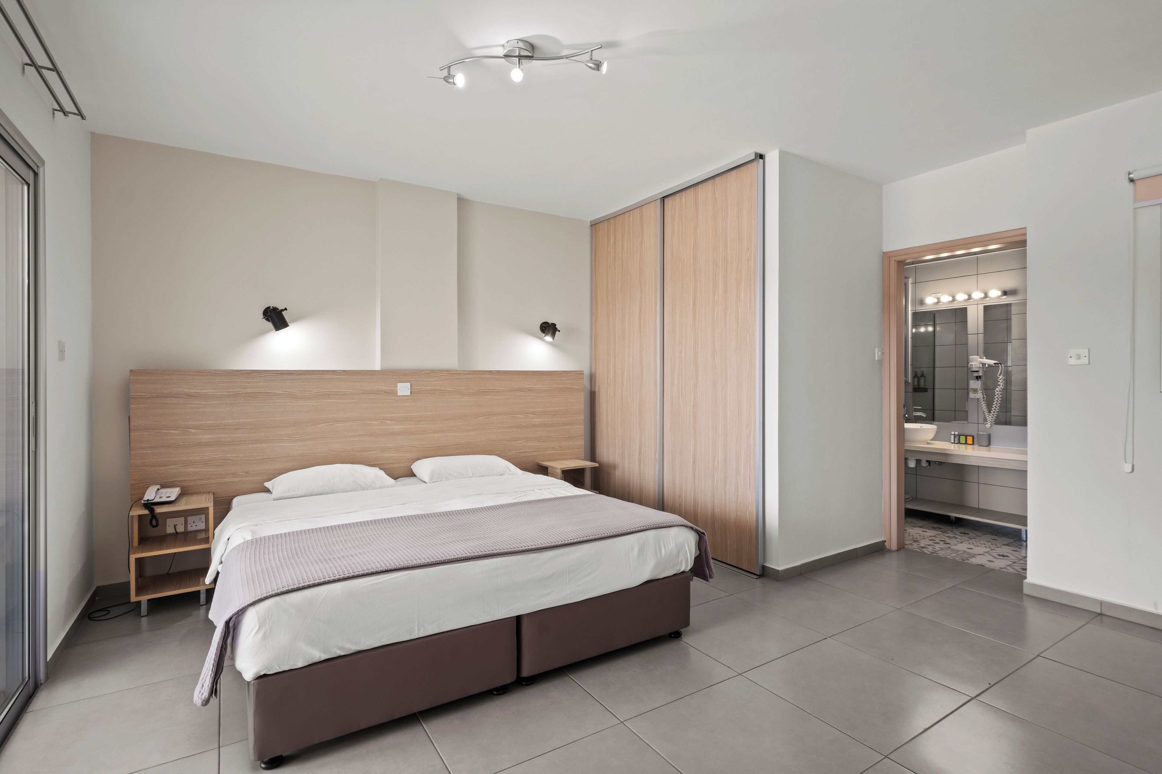 Deluxe Apartment, 1 Bedroom | In-room safe, desk, soundproofing, iron/ironing board