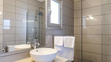 Deluxe Apartment, 1 Bedroom | Bathroom | Bathtub, deep soaking tub, free toiletries, hair dryer