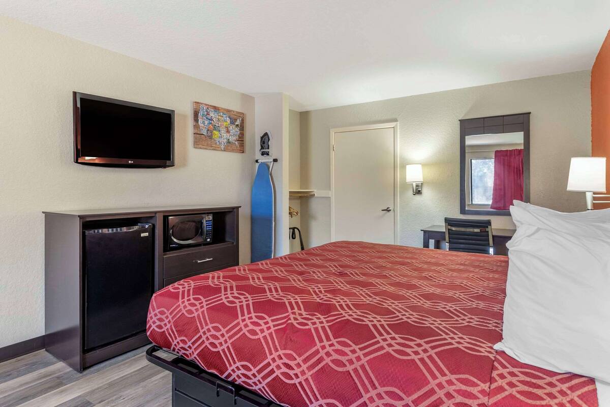 Desk, blackout curtains, iron/ironing board (on request), free WiFi
