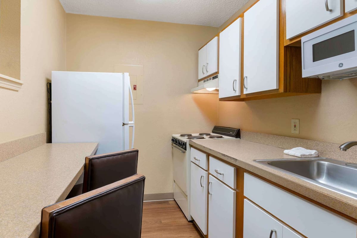 deluxe studio, 1 queen bed with sofa bed, non smoking | desk, laptop workspace, blackout curtains, iron/ironing board