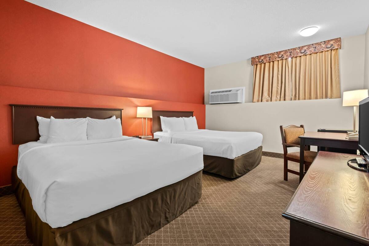 Standard Room, 2 Queen Beds (Basement) | In-room safe, desk, iron/ironing board, alarm clocks