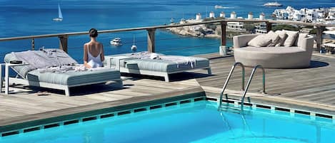 Outdoor pool, pool umbrellas, pool loungers