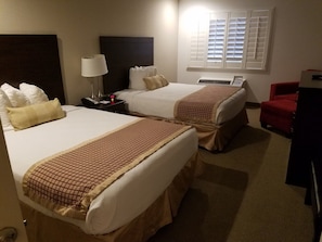Down comforters, pillowtop beds, desk, iron/ironing board