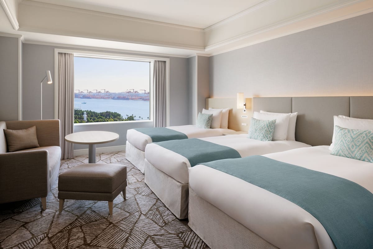 Deluxe Triple Room, Non Smoking | Down duvets, in-room safe, laptop workspace, blackout curtains