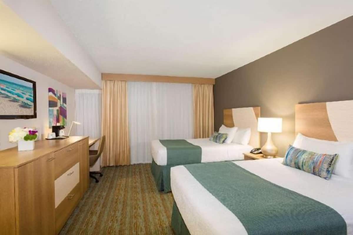 Premium bedding, pillowtop beds, desk, laptop workspace