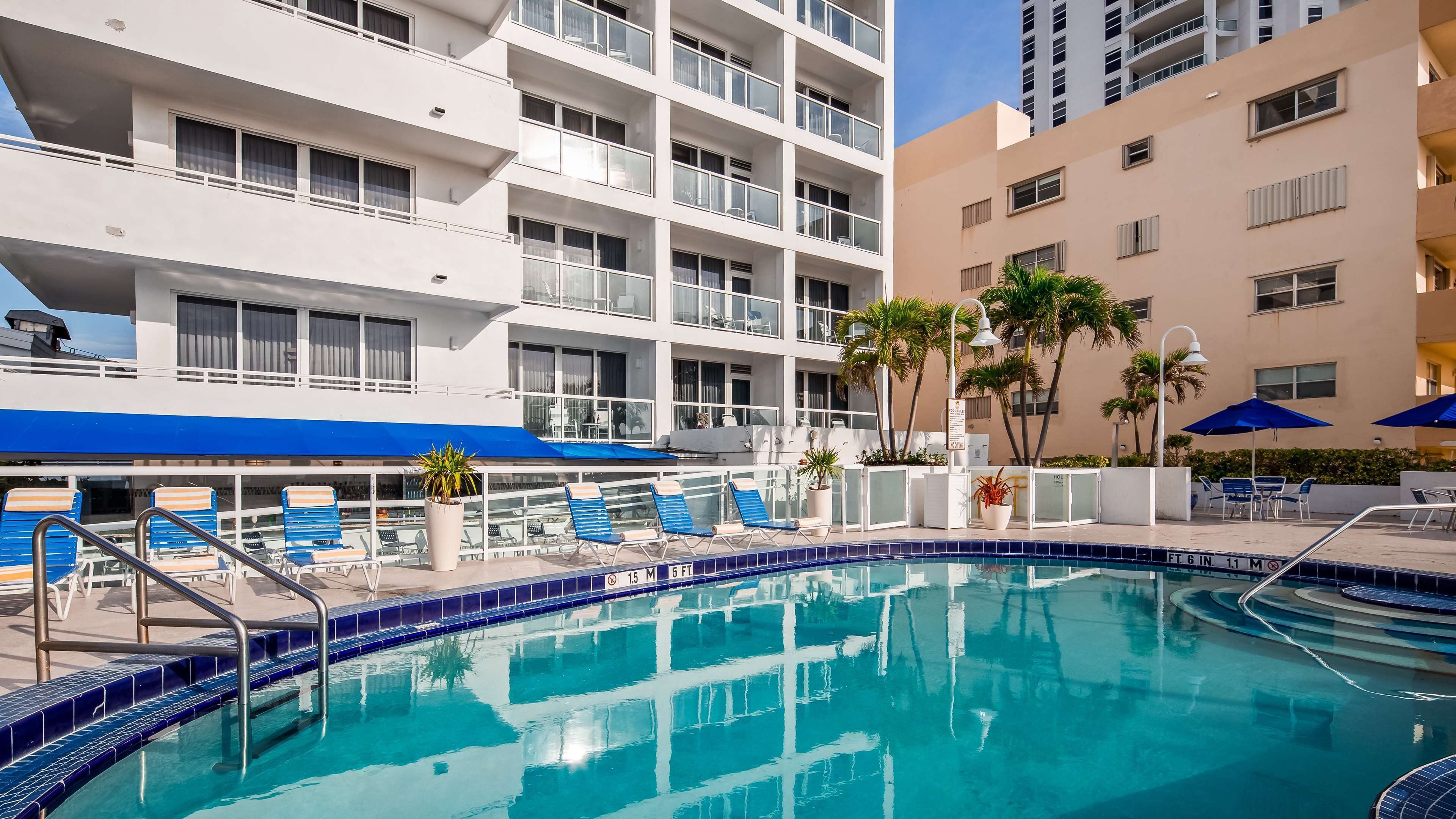 Outdoor pool, pool umbrellas, pool loungers