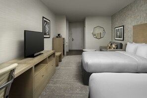 Colchones con pillow-top y caja de seguridad en la habitación