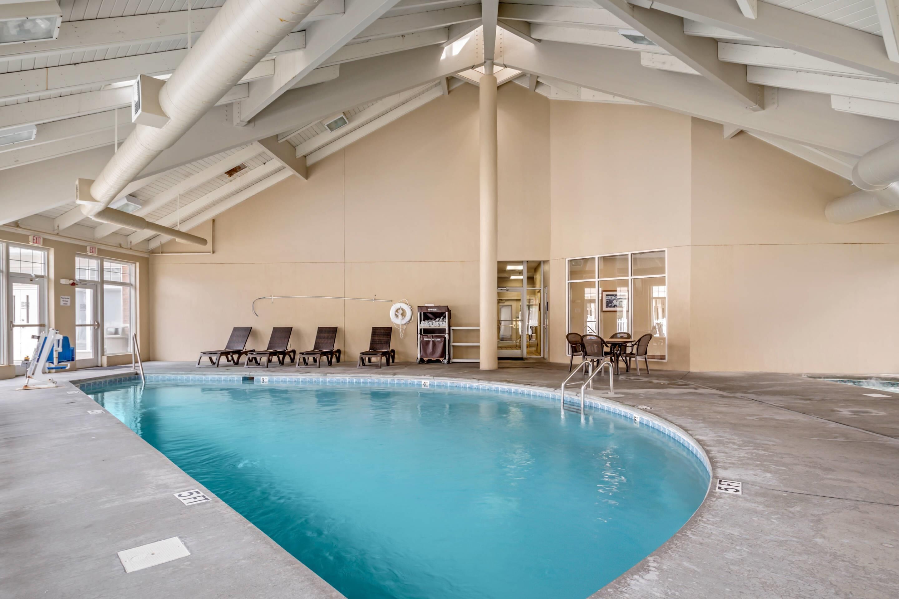 Indoor pool, seasonal outdoor pool, pool umbrellas, sun loungers
